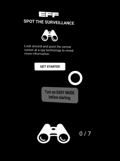 An image of the spot the surveillance entrance screen. The screen contains a "GET STARTED" button and a button below that which says "TURN ON EASY MODE". This gif shows the cursor hovering over "TURN ON EASY MODE" until it is highlighted.