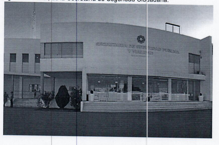 A badly photocopied image of the outside of a government building