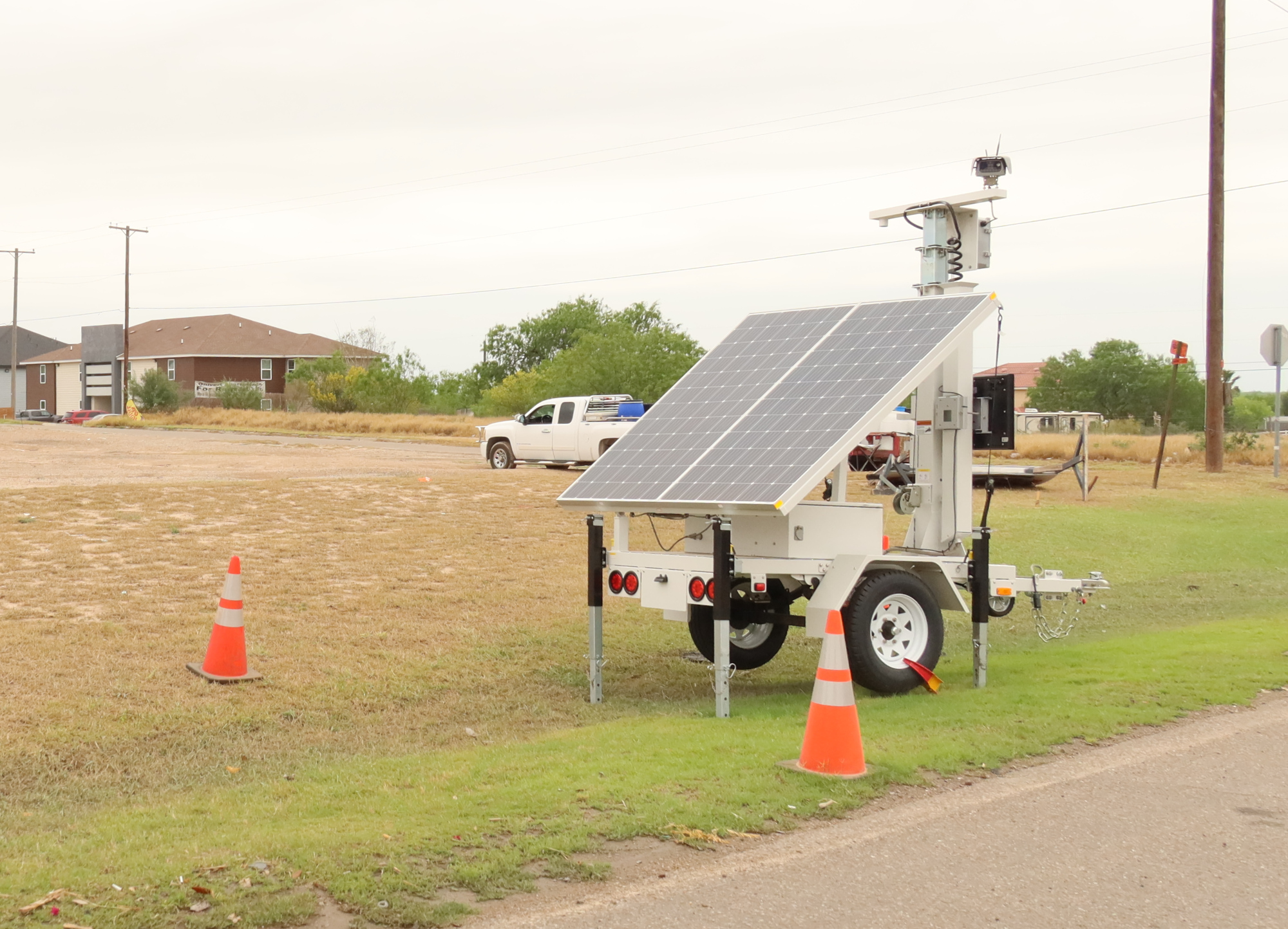 A trailer with a solar panel and an ALPR camera. A trailer with a solar panel and an ALPR camera.